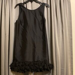 Tibi Black wool & silk mini dress with petal around hem 
SIZE 4
WOMENS